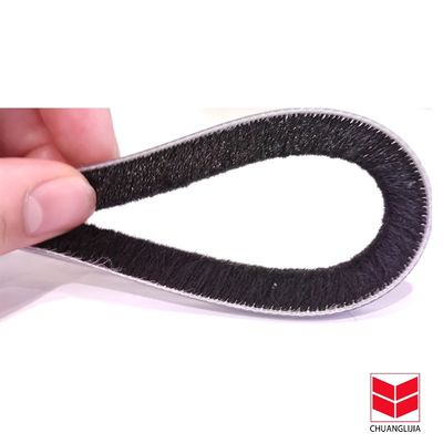 Las bandas de tiempo autoadhesivas para puertas y ventanas de aluminio de pelo de mohair, cepillo de lana, ranura, umbral, banda de sellado